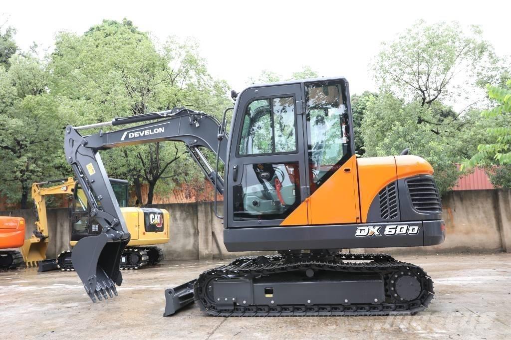 Develon DX 60 D Excavadoras de ruedas