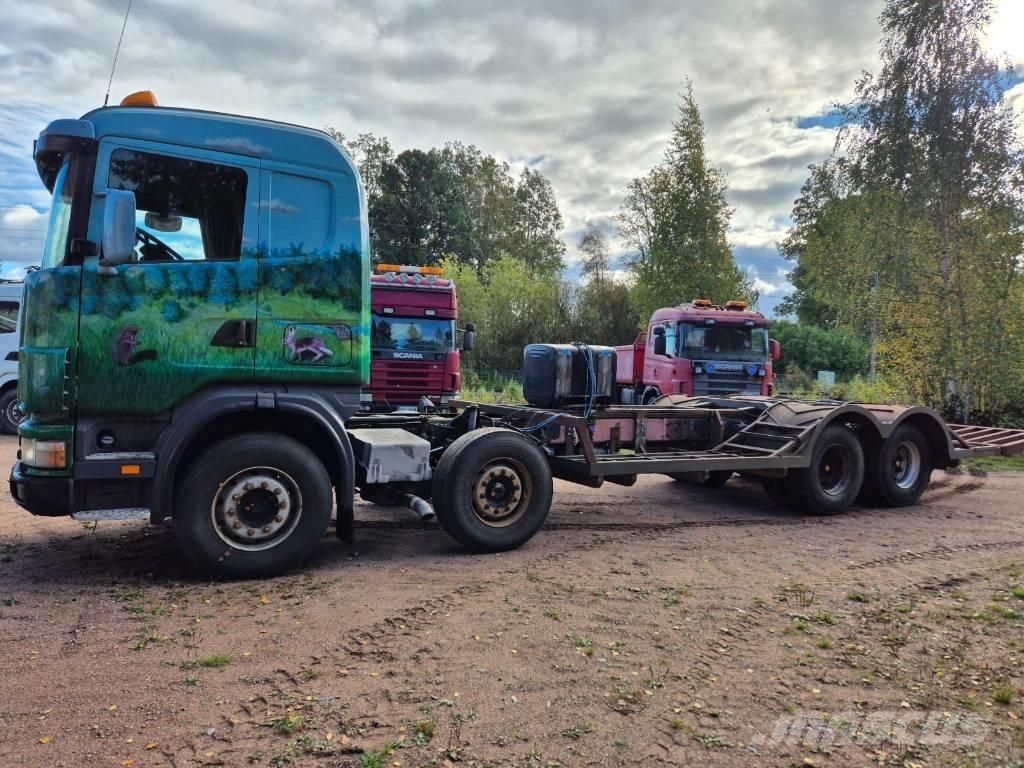 Scania R 124 Camiones de transporte de maquinaria forestal