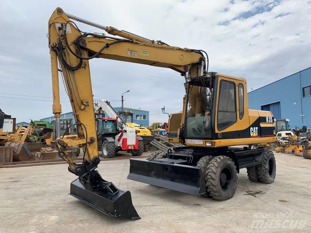 CAT M 315 Excavadoras de ruedas