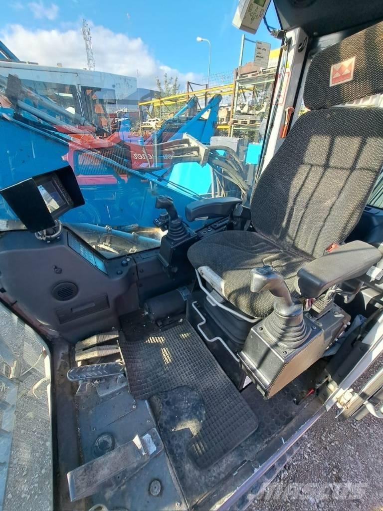 Fuchs MHL 320 Manejadores de residuos industriales