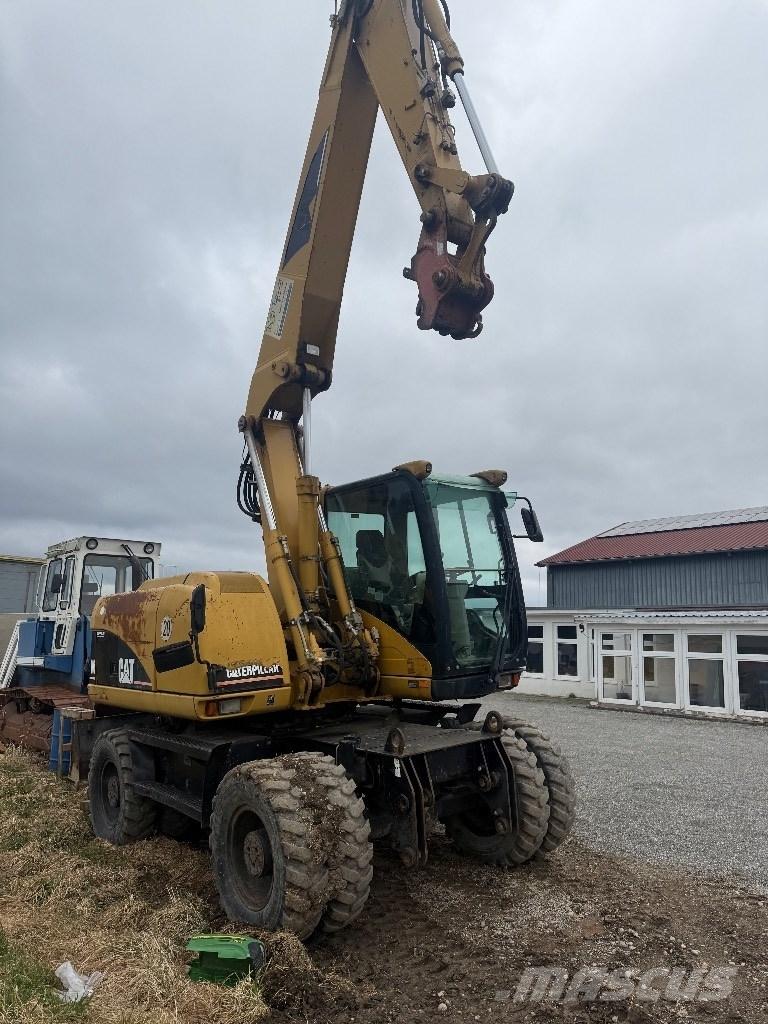 CAT M 313 C Excavadoras de ruedas