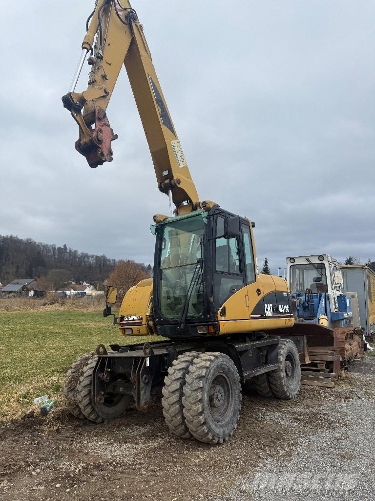 CAT M 313 C Excavadoras de ruedas