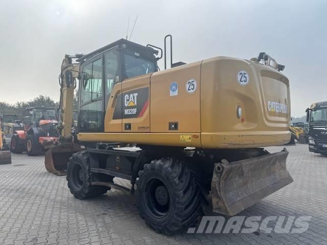 CAT M 320 F Excavadoras de ruedas