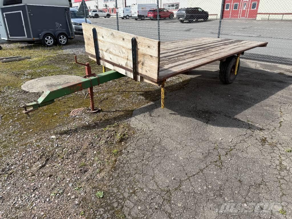  Skogskärra med flak Otros remolques