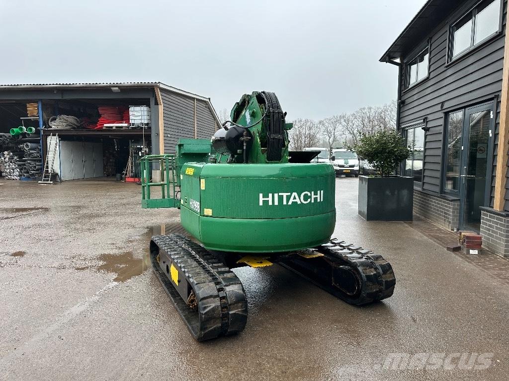 Hitachi HX 99 B Plataformas con brazo de elevación telescópico