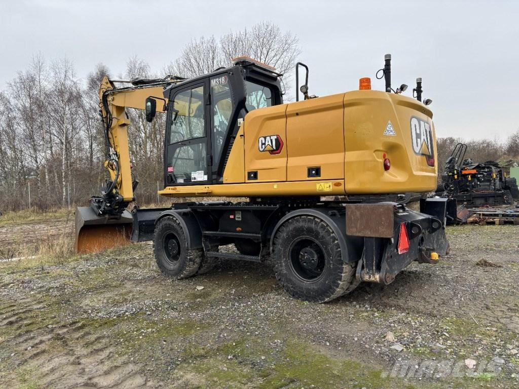 CAT M 318 Excavadoras de ruedas