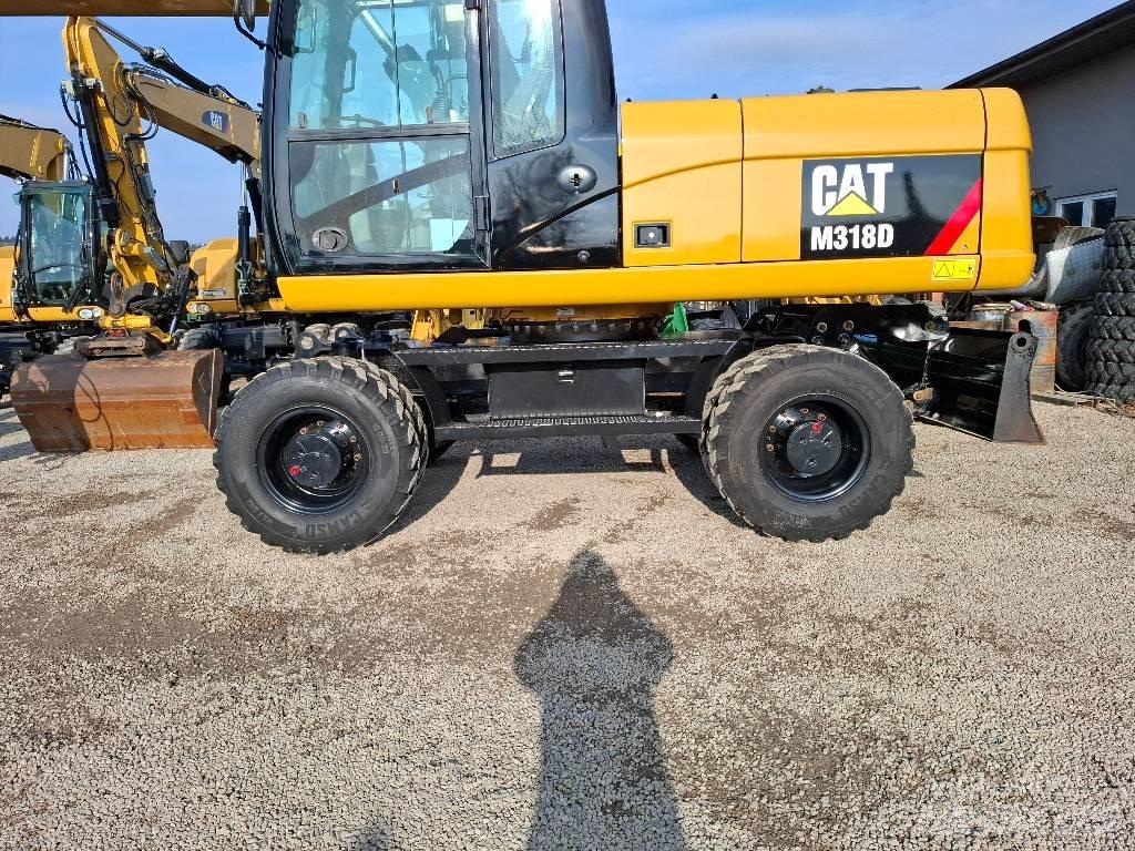 CAT 318 D Excavadoras de ruedas