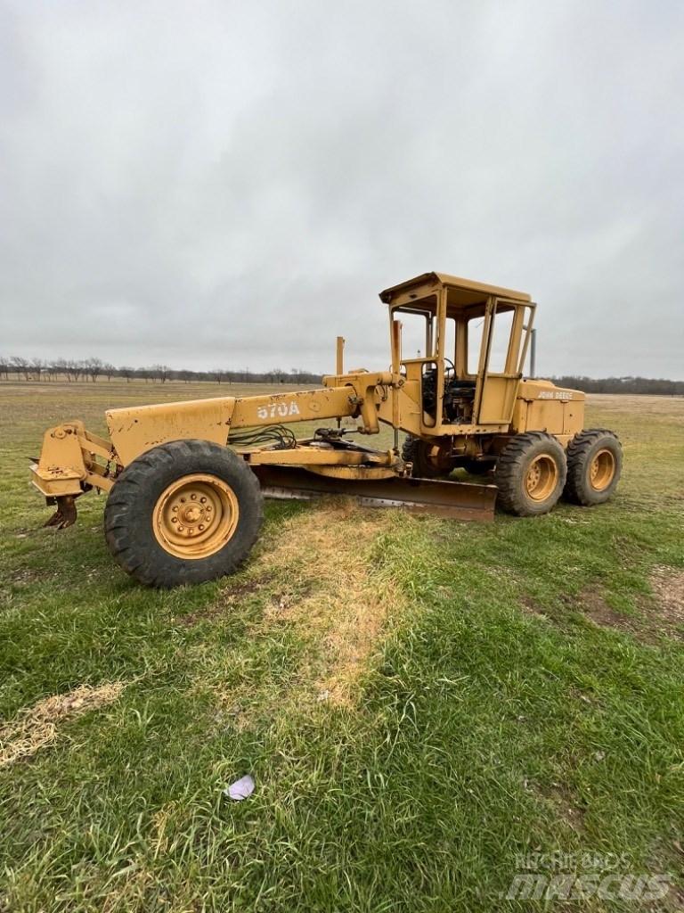 DEERE 570A Niveladoras