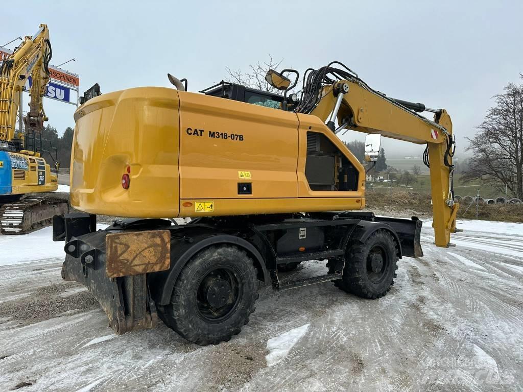 CAT M 318 Excavadoras de ruedas