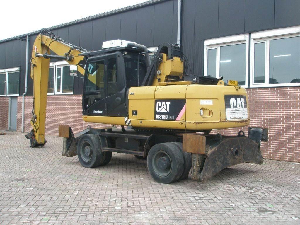 CAT M318D Excavadoras de ruedas