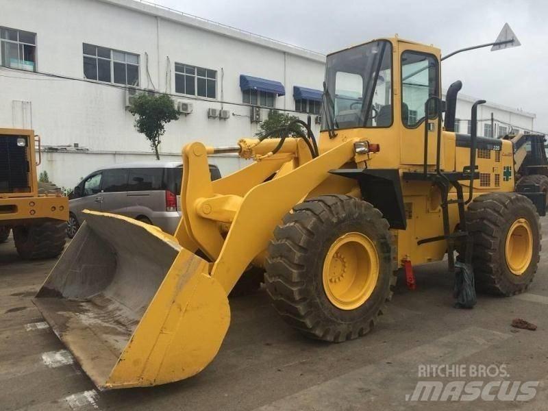 Komatsu WA 320 Retrocargadoras