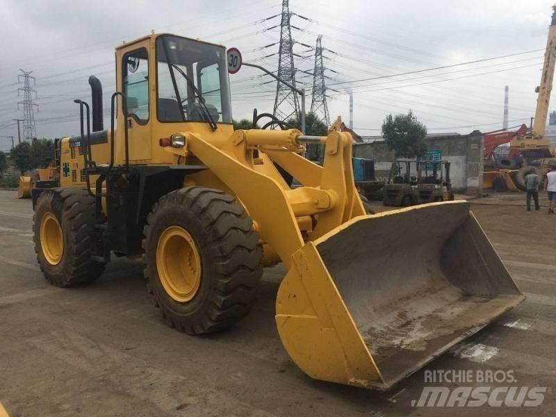 Komatsu WA 320 Retrocargadoras