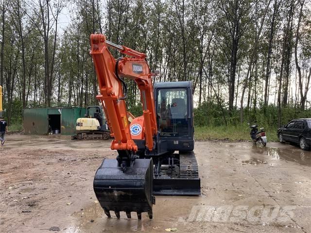 Doosan DH 140 Excavadoras de ruedas