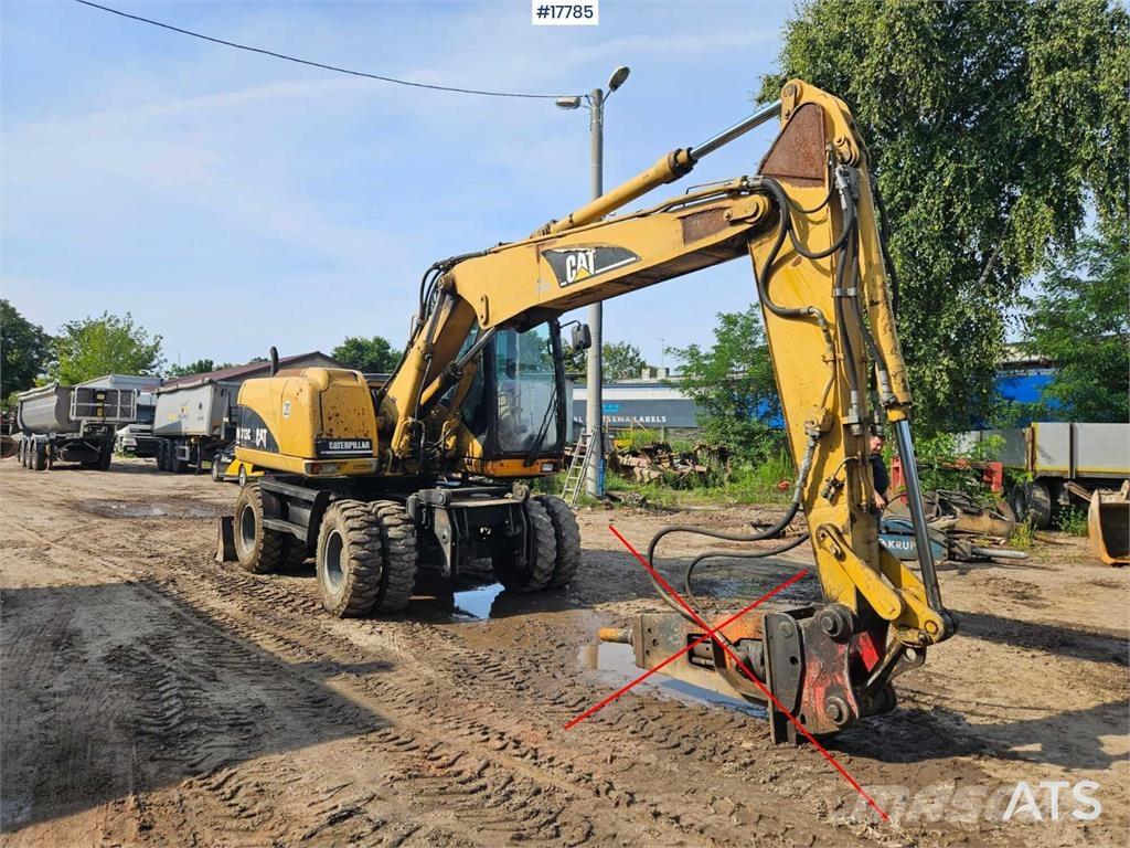 CAT M313 C Excavadoras de ruedas