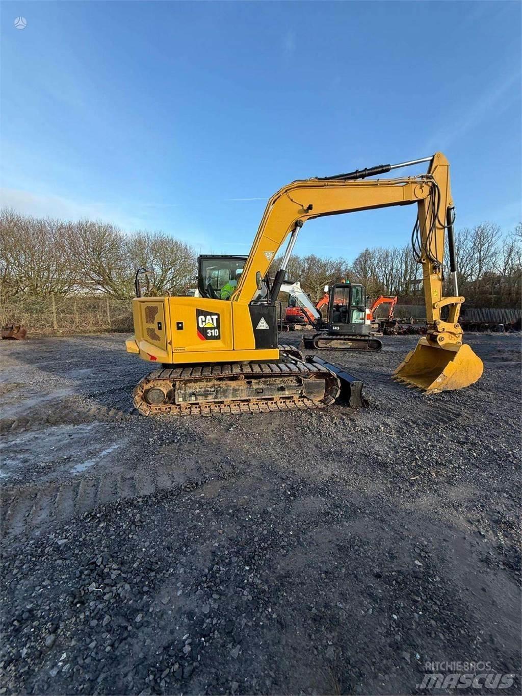 CAT 310 Miniexcavadoras