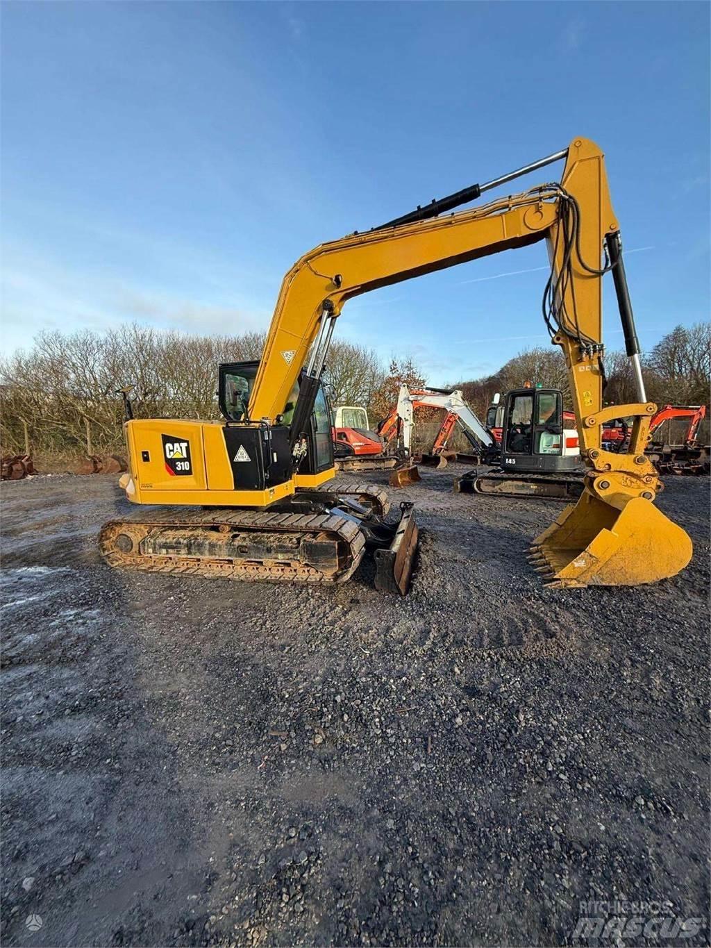 CAT 310 Miniexcavadoras