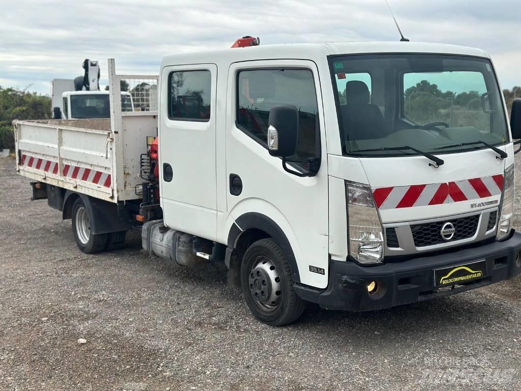 Nissan NT 400 Caja abierta/laterales abatibles