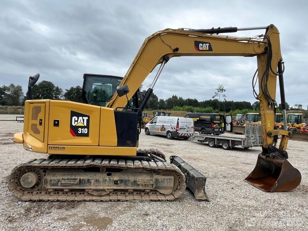 CAT 310 Excavadoras 7t - 12t