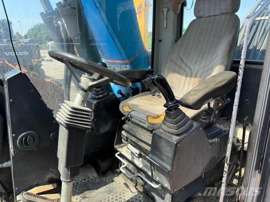 Fuchs MHL 320 Manejadores de residuos industriales