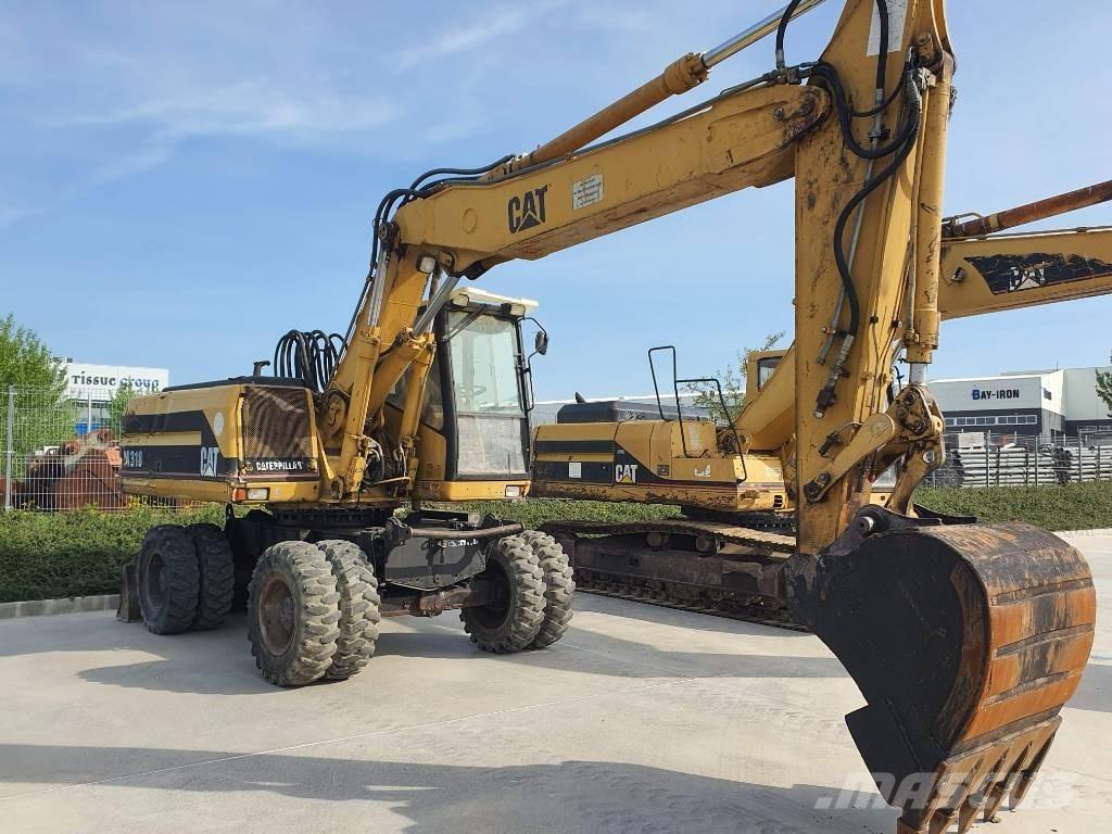 CAT M 318 Excavadoras de ruedas