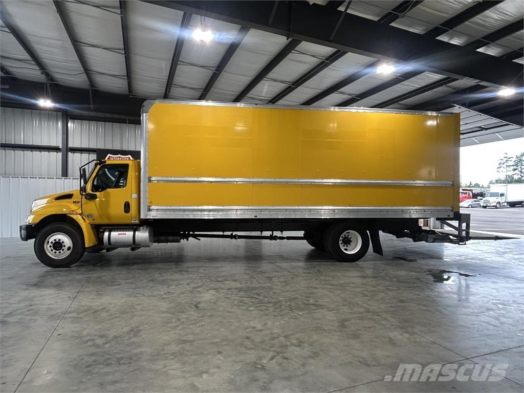 International MV Camiones con caja de remolque