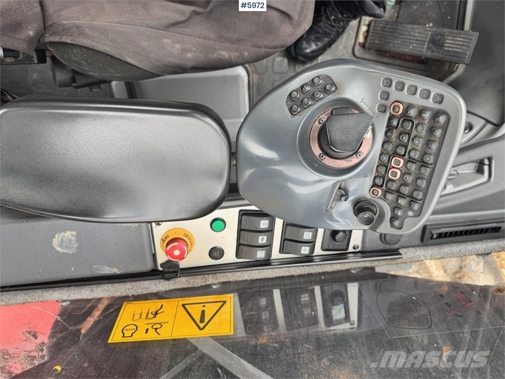 Komatsu 911-6 Cosechadoras