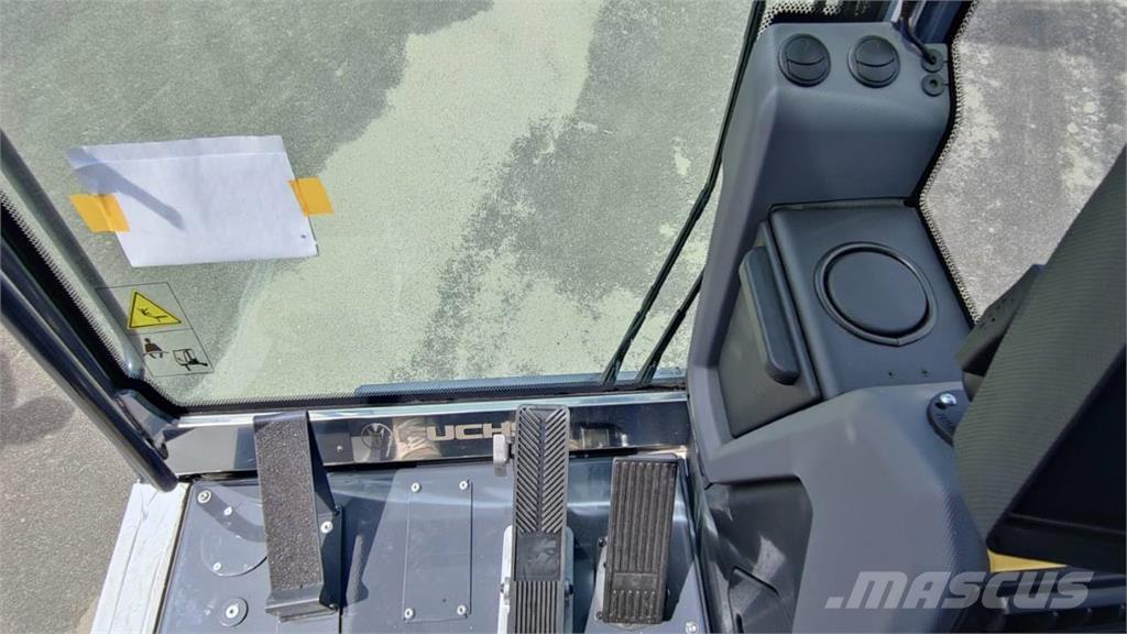 Fuchs MHL 320 Excavadoras de ruedas