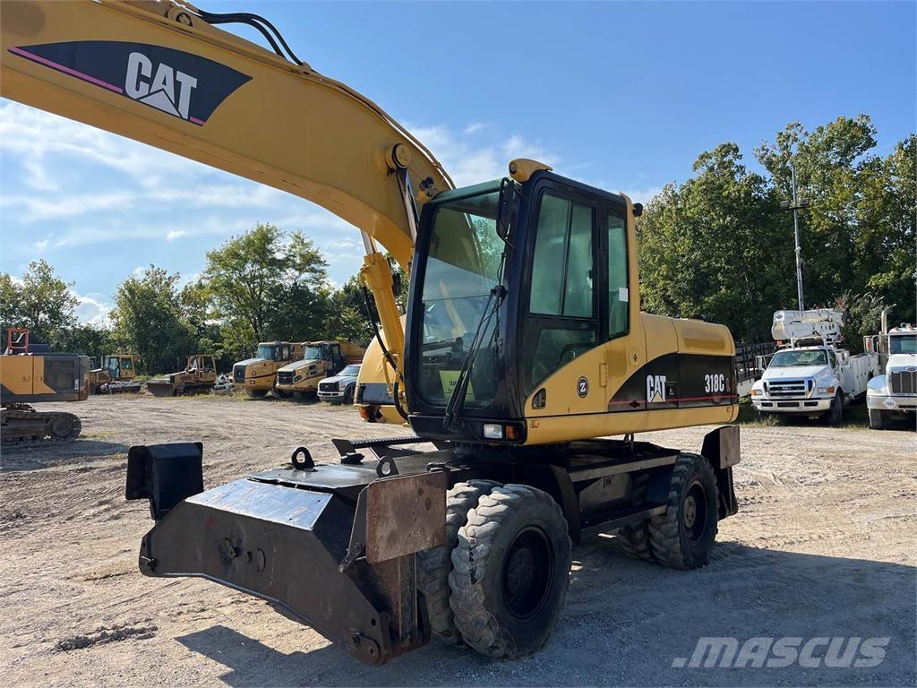 CAT M318C Excavadoras de ruedas