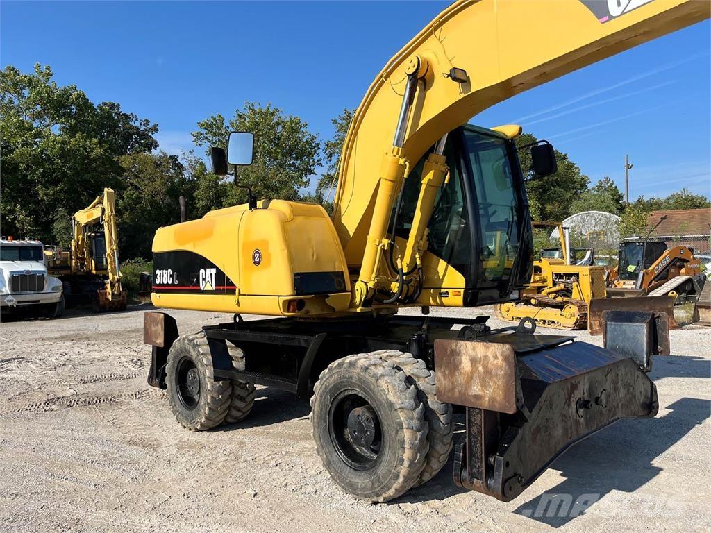 CAT M318C Excavadoras de ruedas