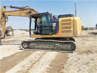 CAT 323 E