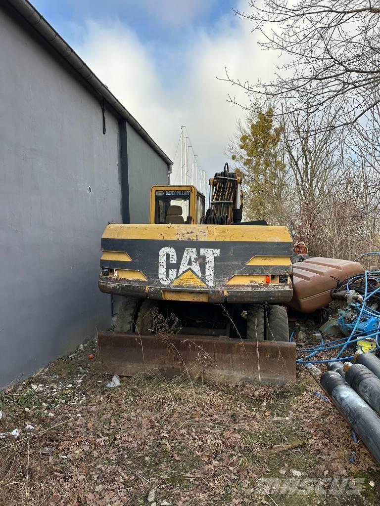 CAT M 320 Excavadoras de ruedas