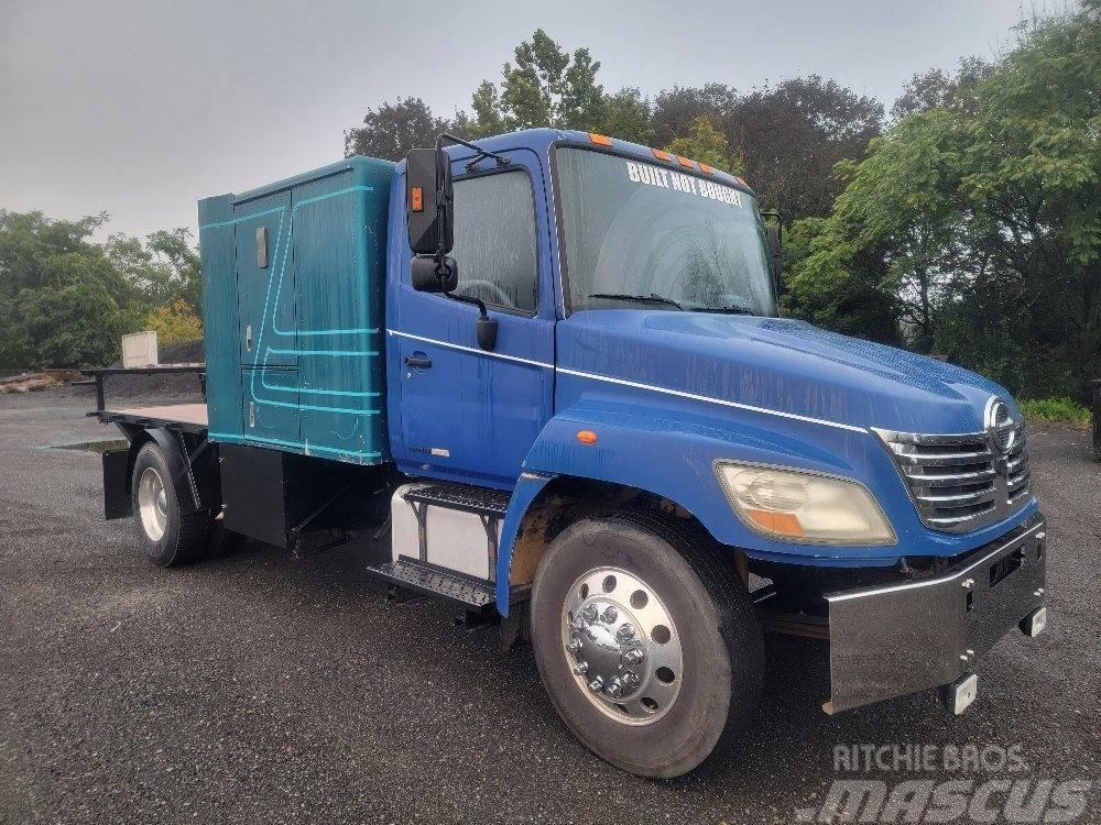 Hino 338 Camiones de cama baja