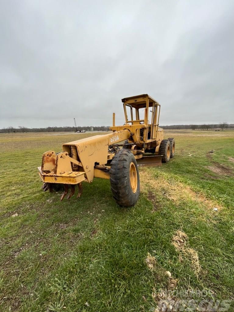 DEERE 570A Niveladoras