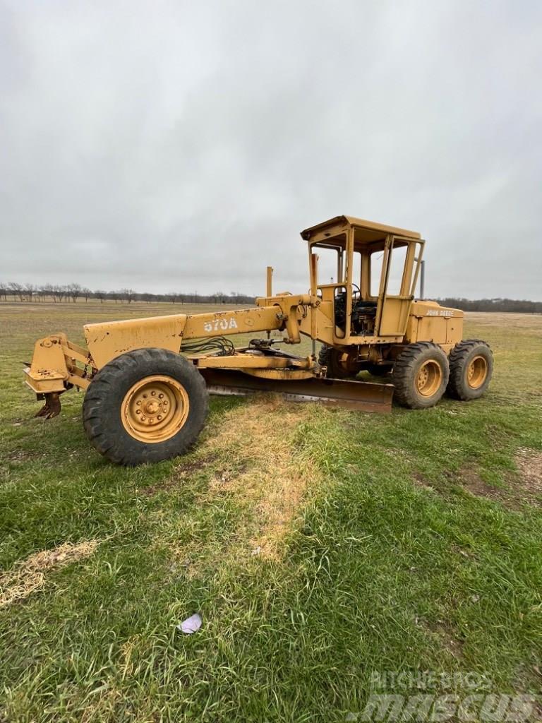 DEERE 570A Niveladoras