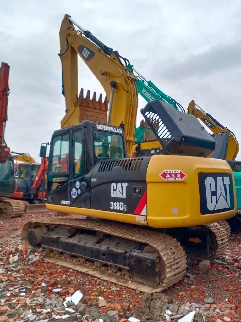 CAT 318D Excavadoras 7t - 12t