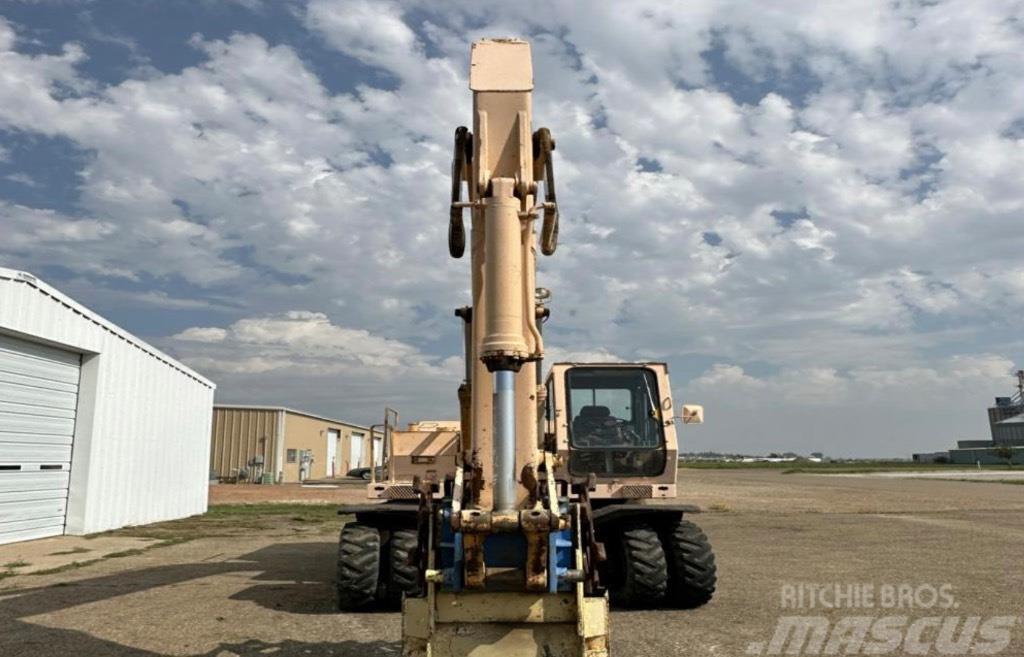 John Deere 595 Excavadoras de ruedas