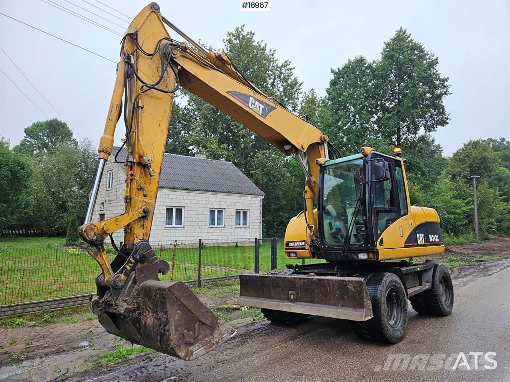 CAT M313C Excavadoras de ruedas