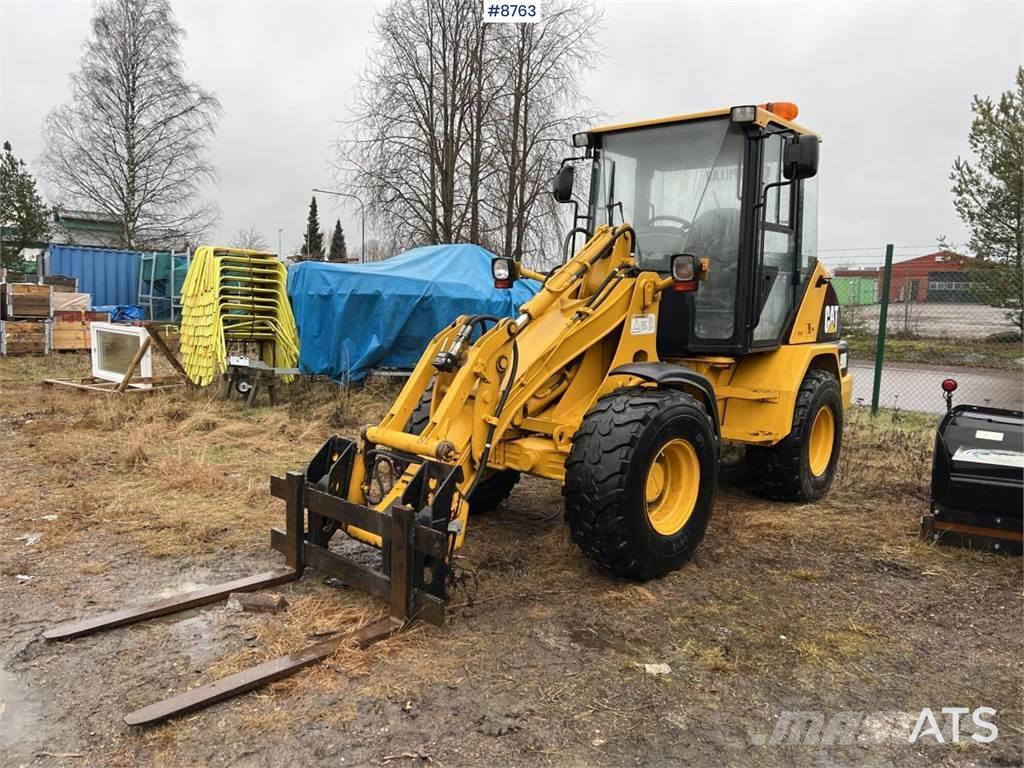 CAT 906 Buldozer sobre ruedas