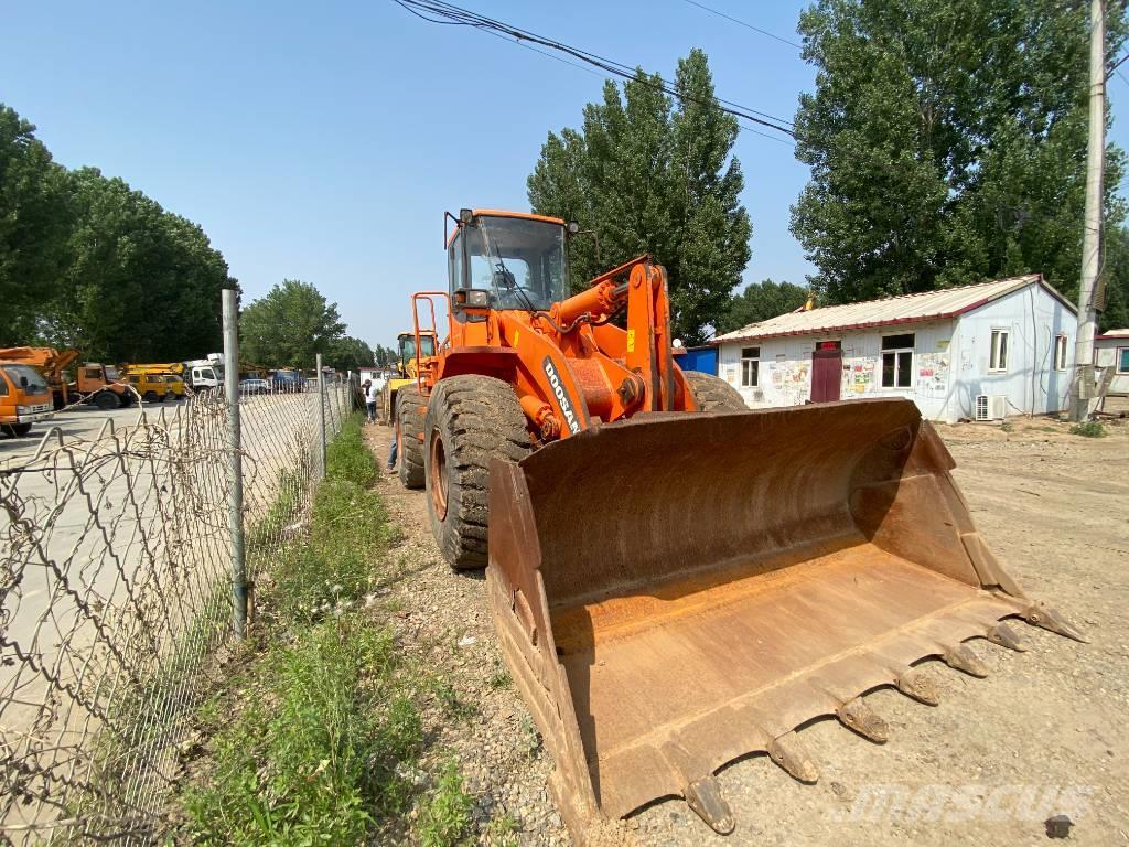 Doosan DL503 Retrocargadoras