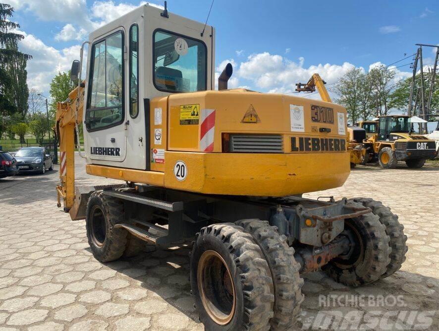 Liebherr A310B Excavadoras de ruedas