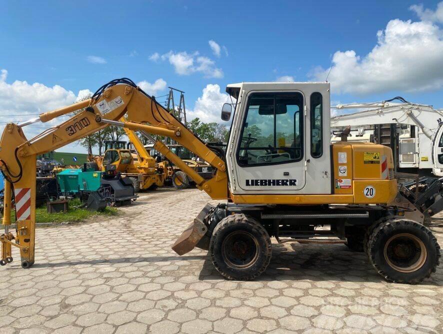 Liebherr A310B Excavadoras de ruedas