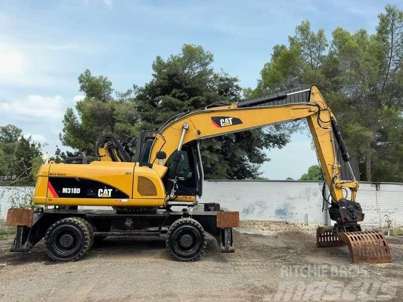 CAT M318D Excavadoras de ruedas