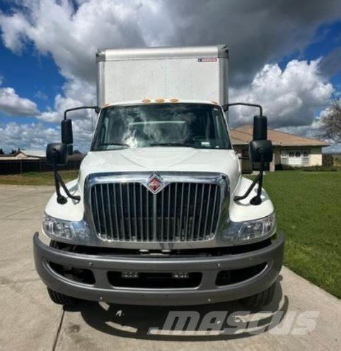 International MV Camiones con caja de remolque