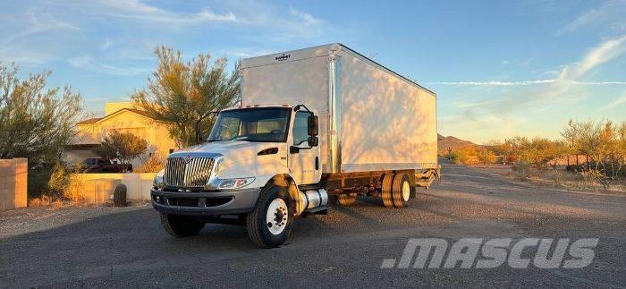 International MV Camiones con caja de remolque